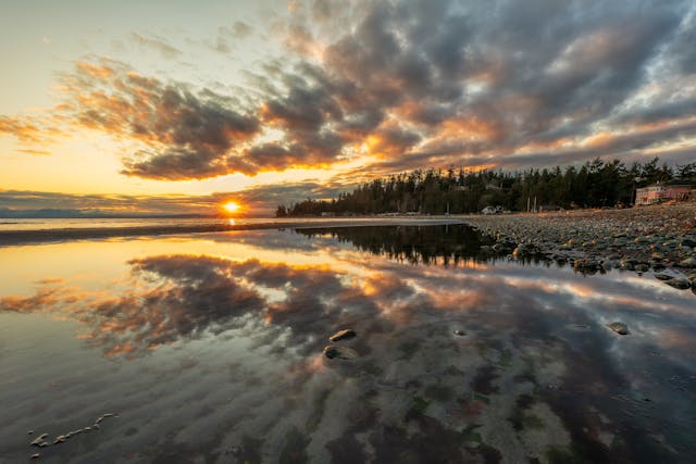 a sunset over a beach
