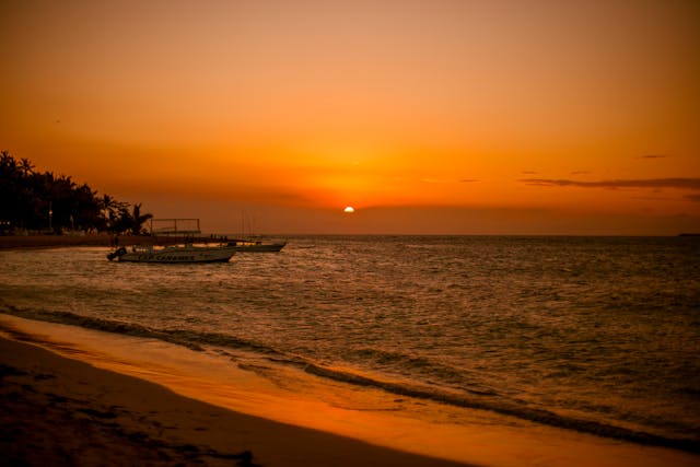 a sunset over a body of water