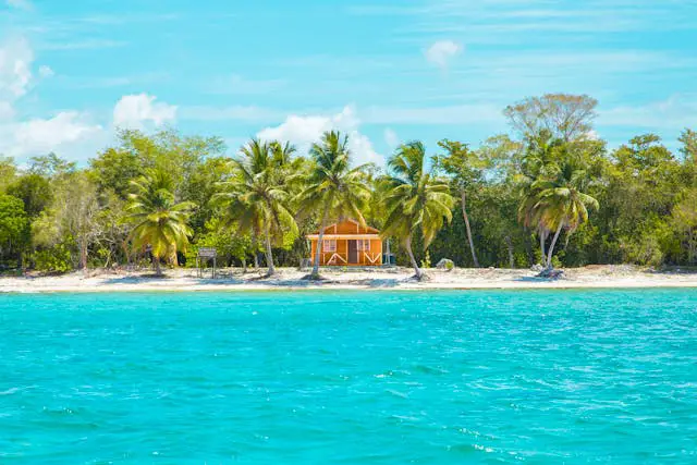 Tropical beach with a colorful house