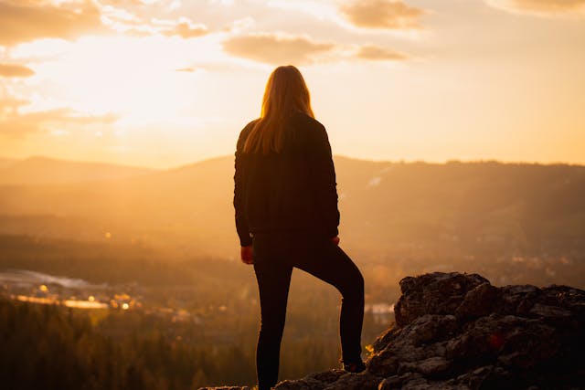 Silhouette of person against sunset