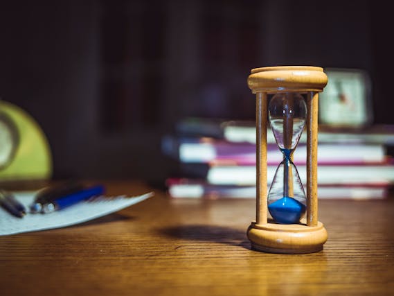 Wooden hourglass on a table